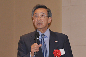 Chairman Asada delivering a speech at the seminar